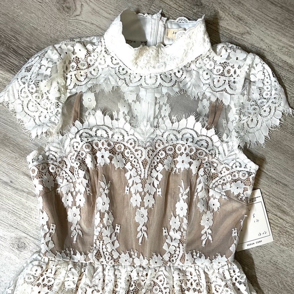 Lace feminine dress size small fully lined with two underneath